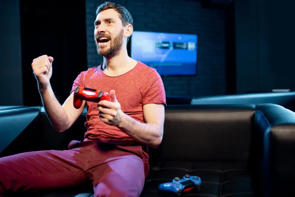 happy-man-playing-video-games-with-gaming