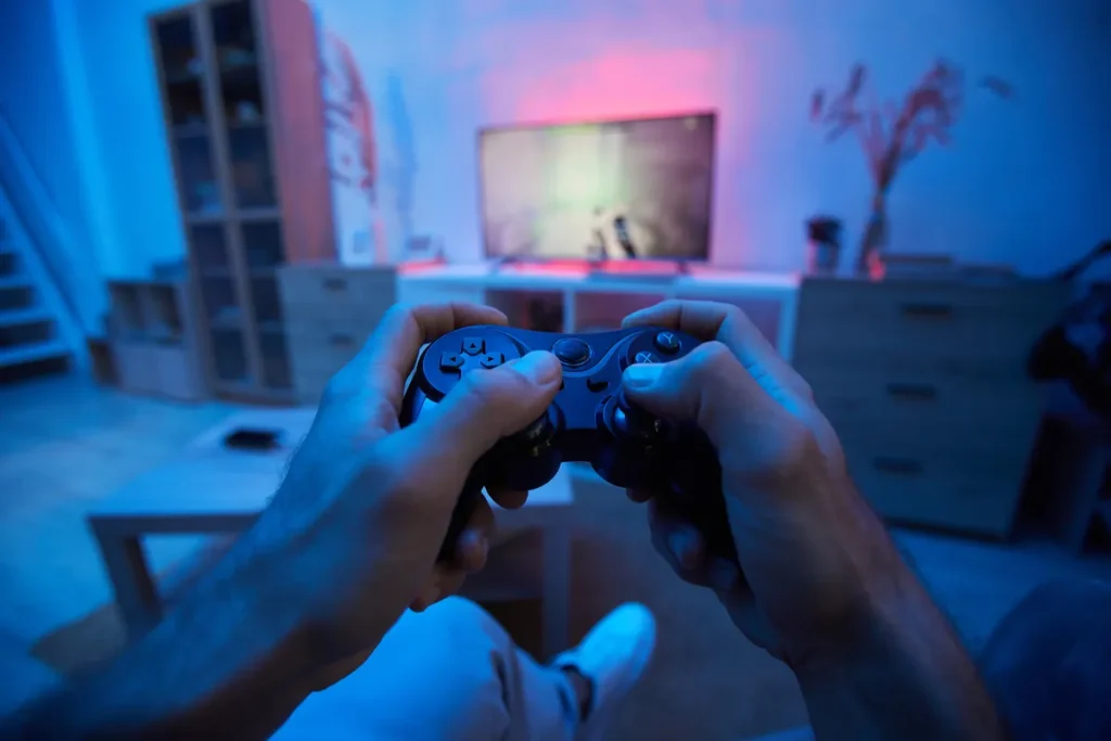 man-using-joystick-in-game