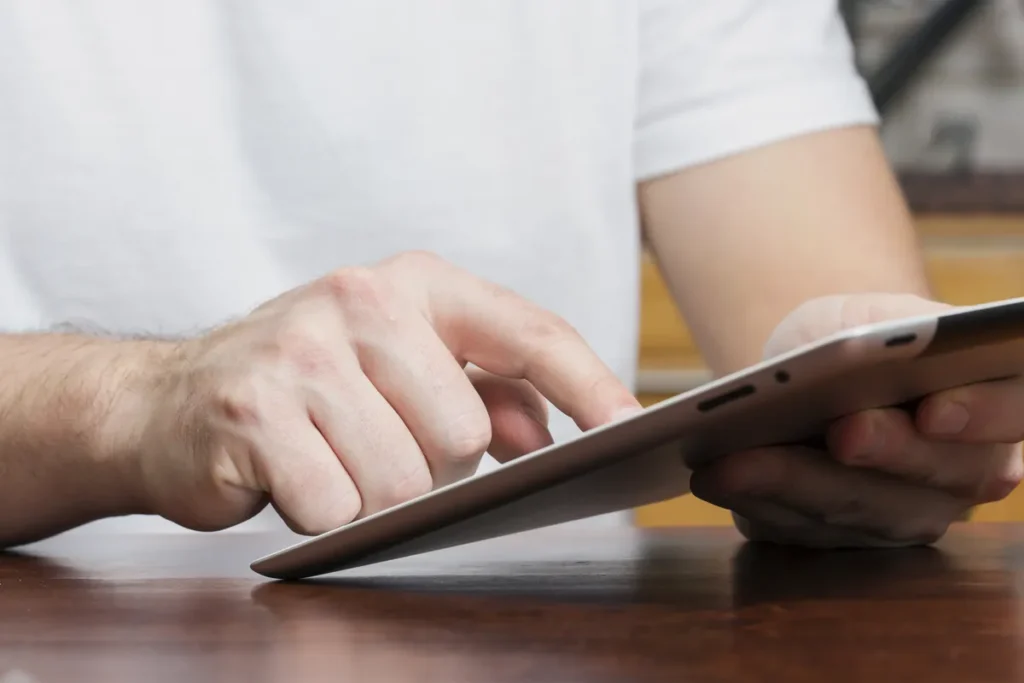 man-is-using-a-tablet