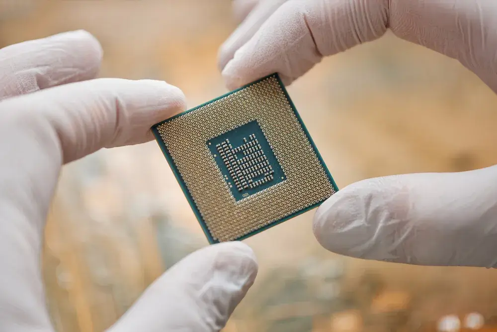 technician-holding-microchip