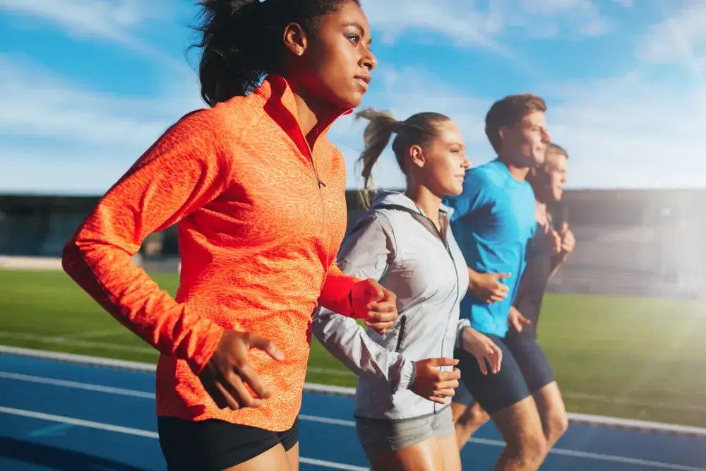 woman-running-with-her-team