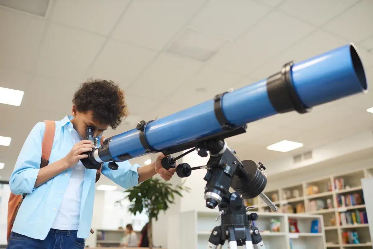 boy-looking-through-telescope