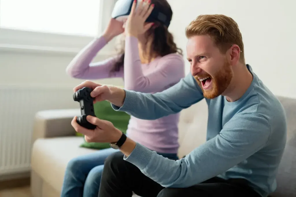 happy-young-couple-playing-video-games