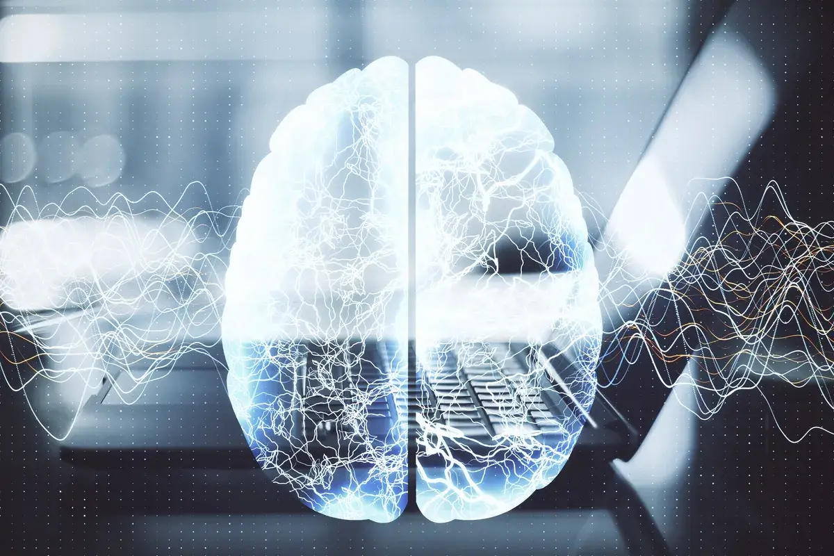laptop-with-glowing-brain-and-lines-hologram