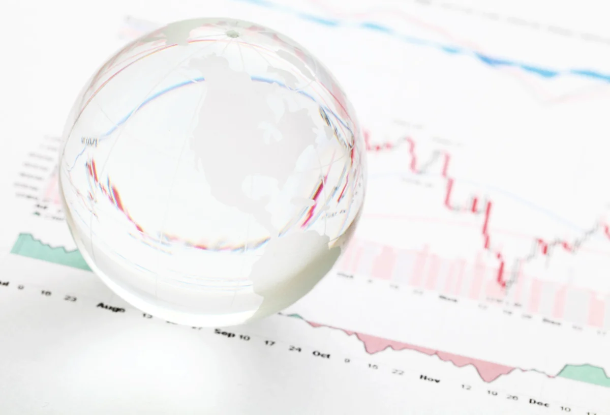 glass-globe-over-financial-market