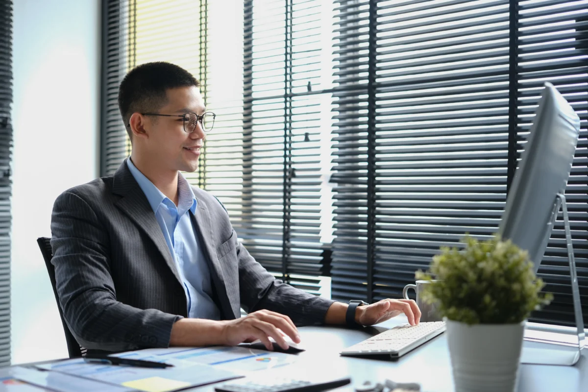man-working-at-desk-in-office-building