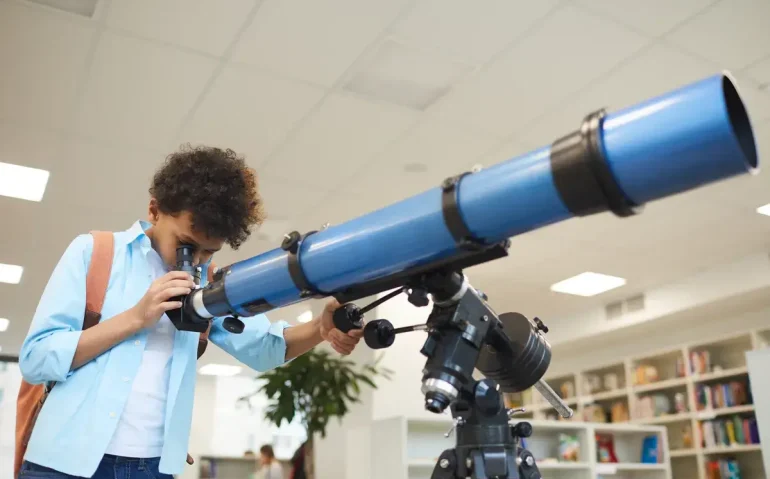 boy-looking-through-telescope