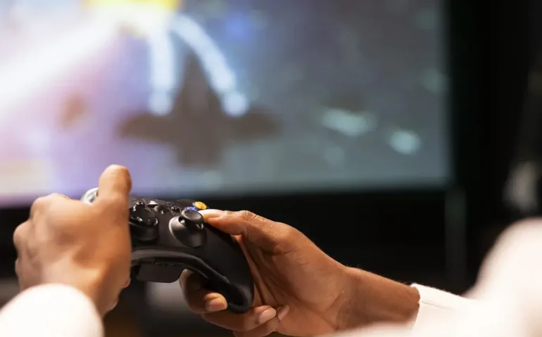 close-up-shot-of-controller-held-by-man