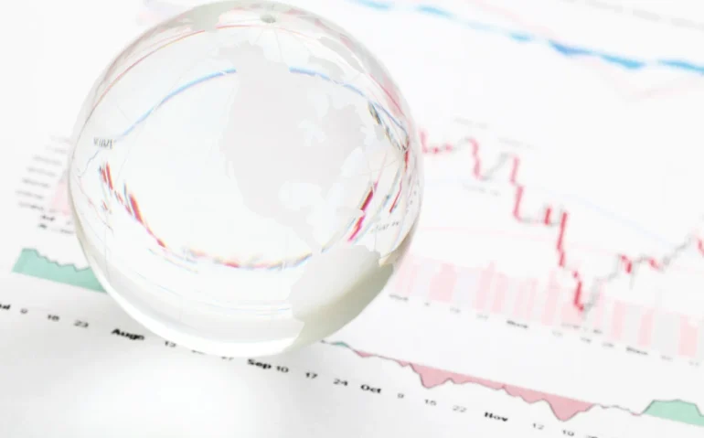 glass-globe-over-financial-market