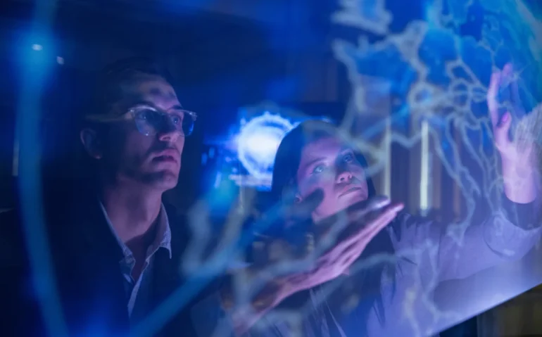 man-and-woman-using-futuristic-technology