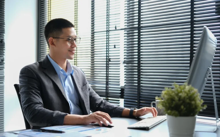 man-working-at-desk-in-office-building