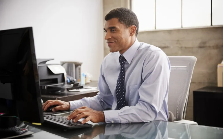 mixed-race-businessman-using-computer