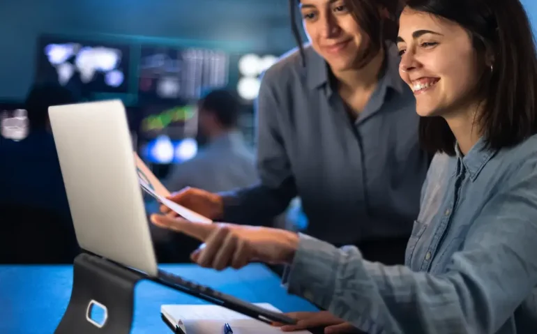 multiracial-female-stock-traders-analyze