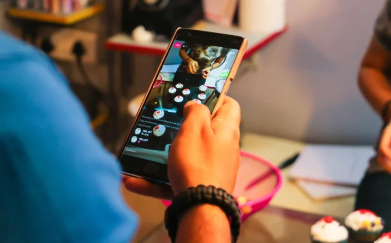 person-on-phone-streaming-cupcake