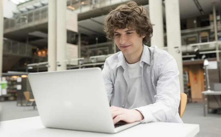 student-using-laptop-in-a-university