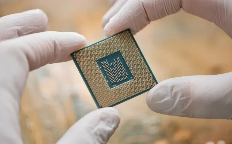 technician-holding-microchip