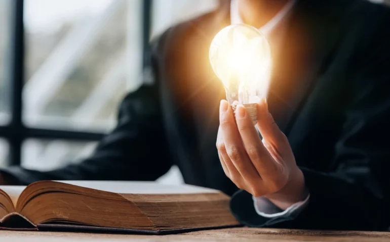 woman-holding-lightbulb