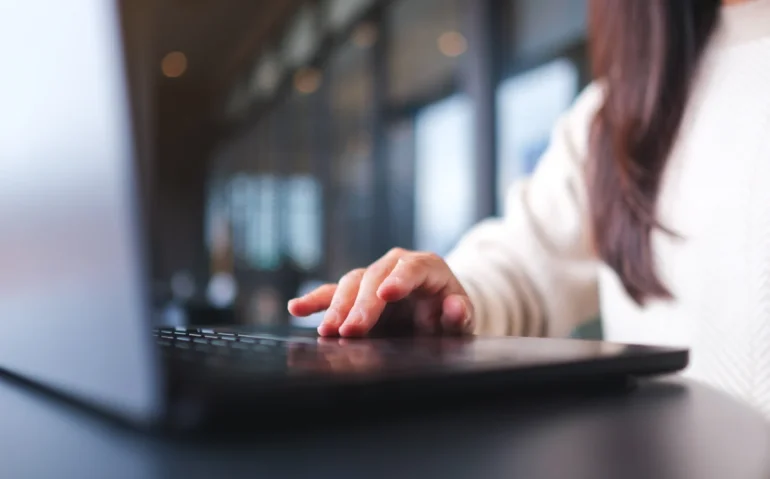 woman-typing-on-laptop-in-a-modern