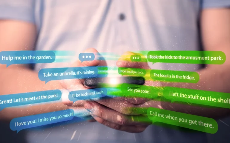 young-man-writing-messages-with-smartphone